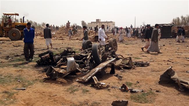 Yemenis gather at the site of a Saudi airstrike on the outskirts of the city of Sa