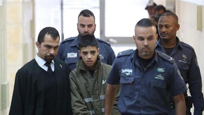 This file photo shows teenage Palestinian prisoner Ahmad Saleh Manasra (C).
