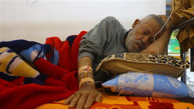 A Palestinian man suffering from cancer lies at a hospital in Gaza City in the besieged Gaza Strip on April 6, 2017. (Photo by AFP)
