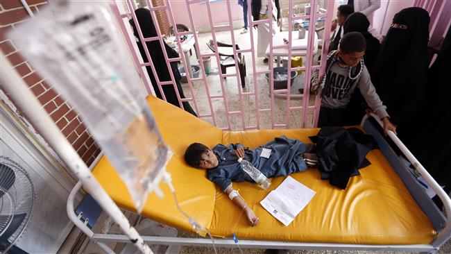 Yemeni children suspected of being infected with cholera receive treatment at a hospital in the capital Sana’a, on August 12, 2017. (Photo by AFP)
