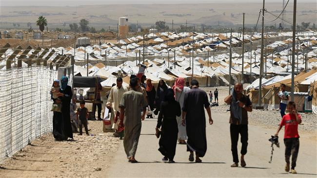 Displaced people who have fled their homes gather at Salamiyah camp, near Mosul, Iraq, July 26, 2017. (Photo by Reuters)
