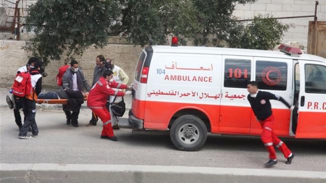 This file photo shows Palestinian medics and an ambulance of the Palestine Red Crescent Society in the occupied West Bank.
