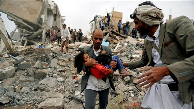 A man carries a little girl, the sole survivor of her family, rescued from the site of a Saudi airstrike that killed her parents and six of her siblings in Sana’a, Yemen, August 25, 2017. (Photo by Reuters)