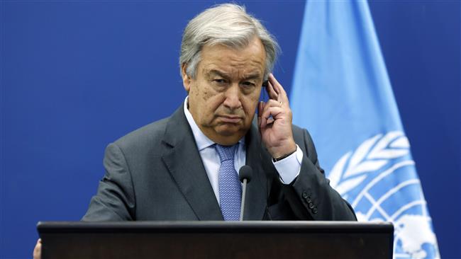 United Nations Secretary General Antonio Guterres listens to translations during a joint press conference with Palestinian Prime Minister Rami Hamdallah (unseen) in the West Bank city of Ramallah on August 29, 2017. (Photo by AFP)
