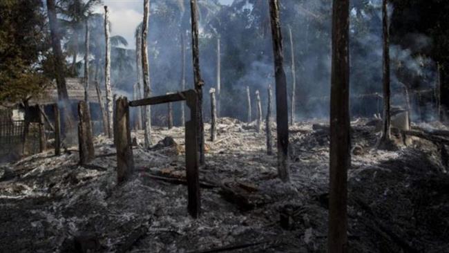 A file photo of burnt houses of Rohingya Muslims in Rakhine State (By AFP)
