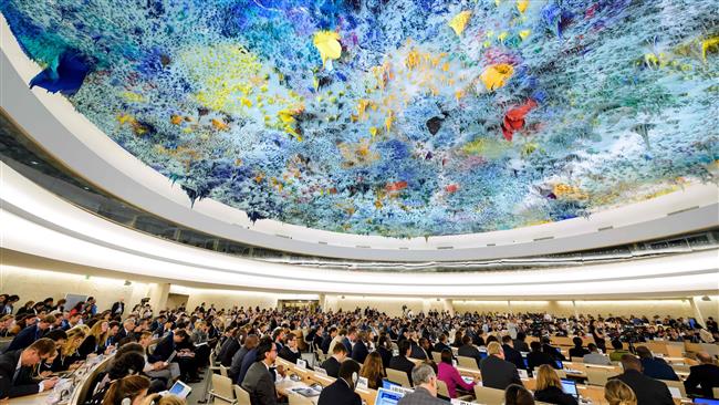 Delegates participate at a meeting of UN Human Rights Council in Geneva on June 6, 2017. (Photo by AFP)
