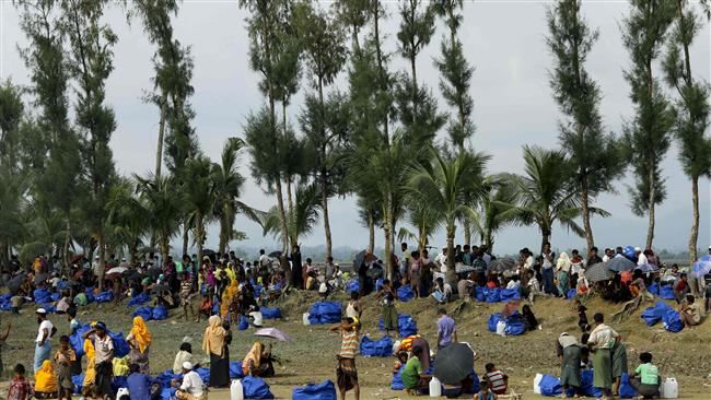 Displaced Rohingya Muslim refugees from Rakhine state in Myanmar rest near Ukhia, at the border between Bangladesh and Myanmar, as they flee violence, September 4, 2017. (Photo by AFP)
