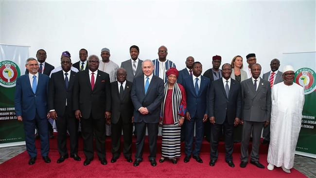 In this handout photograph, released by the press service of the Ivory Coast presidency on June 5, 2017, participants are seen at a meeting of the Economic Community of West African States (ECOWAS) in Monrovia, Liberia, on June 4, 2017. Israeli Prime Minister Benjamin Netanyahu (Front-5th from L) is among the attendees. (Via AFP)
