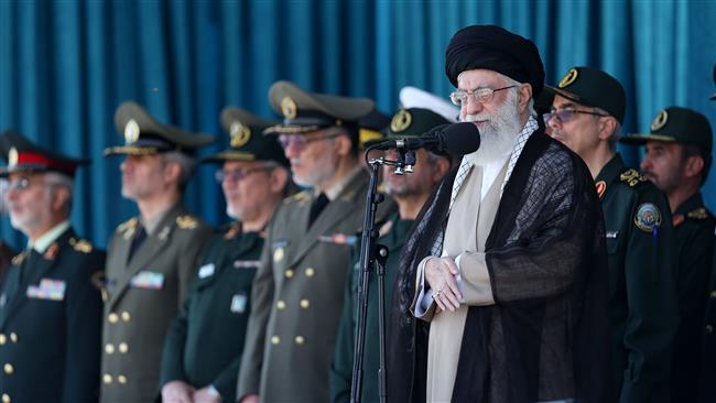 Leader of the Islamic Revolution Ayatollah Seyyed Ali Khamenei looks on as graduation ceremony of Iran