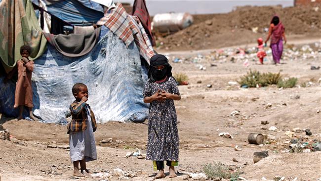 Displaced Yemeni children stand outside a make-shift shelter at a camp for internally displaced persons (IDPs) on the outskirts of Sana’a, Yemen, April 15, 2017. (Photo by AFP)
