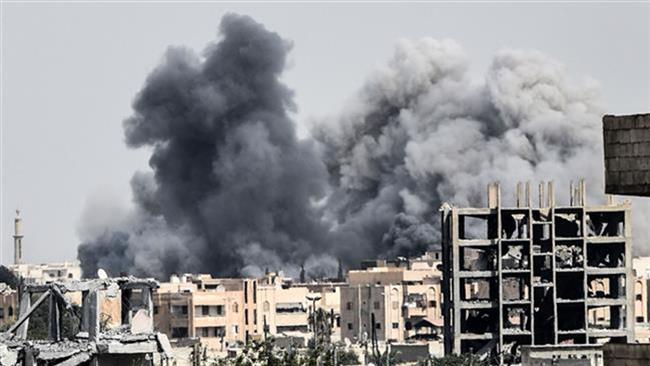 Heavy smoke billows following a US airstrike on the western frontline of Raqqah on July 17, 2017. (Photos by AFP)