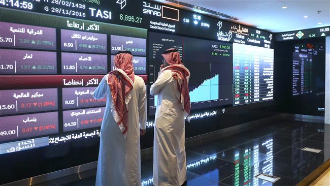 Investors monitor stock exchange at the Saudi Stock Exchange, or Tadawul. (file photo)
