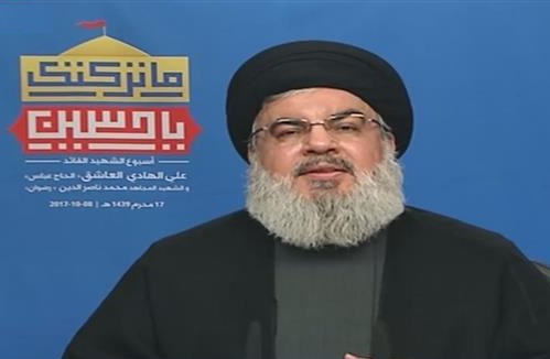 Secretary general of the Lebanese Hezbollah resistance movement, Sayyed Hassan Nasrallah, delivers a televised speech from al-Ain town in North Bekaa region on October 8, 2017.
