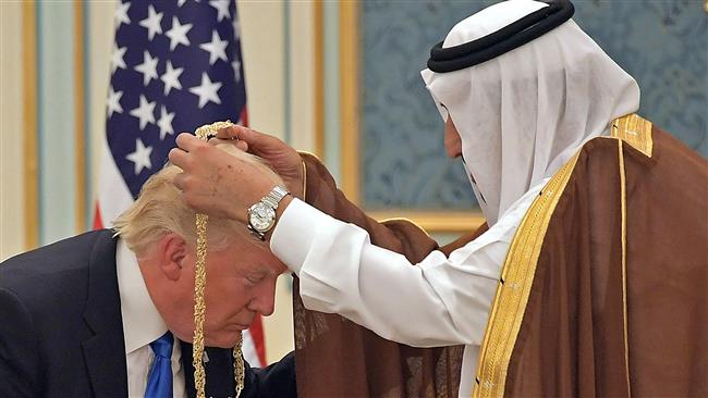 US President Donald Trump receives the Order of Abdulaziz al-Saud medal from Saudi Arabia