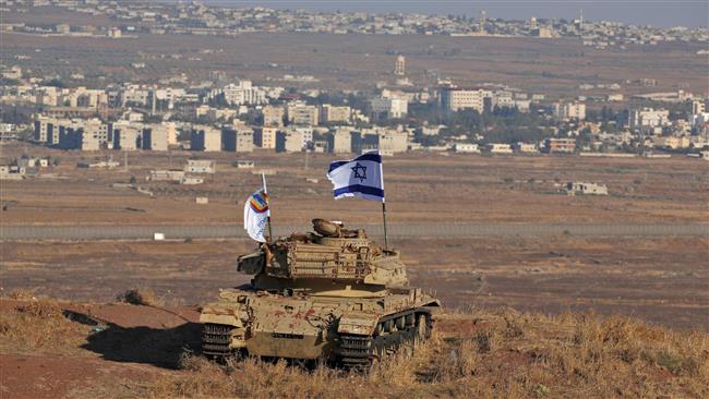 The photo shows the wreckage of an Israeli tank in the Israeli-occupied sector of Syria’s Golan Heights overlooking the border with Syria and the town of Quneitra on October 18, 2017. (Photo by AFP)
