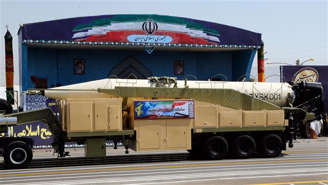 The new Iranian long-range missile, Khorramshahr, is displayed in Tehran during the military parade marking the annual Sacred Defense Week, on September 22, 2017. (Photo by AFP)
