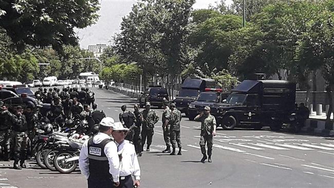 This file image shows Iranian security forces stationed in front of the country’s parliament in downtown Tehran after Takfiri Daesh terrorists attacked the building of the legislative body on June 7, 2017.