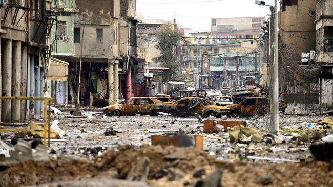 Cars burnt and destroyed are seen on a street during a battle between Iraqi forces and Daesh terrorists in Mosul, Iraq, on March 16, 2017. (Photo by Reuters)
