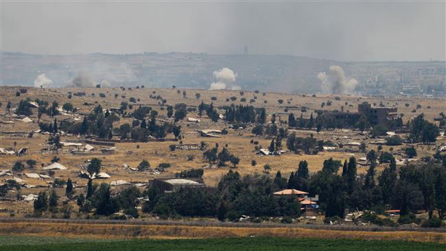 The picture, taken from the Israeli-occupied Golan Heights, shows smoke billowing from Syria after an Israeli aerial attack on June 25, 2017. (Photo by AFP)
