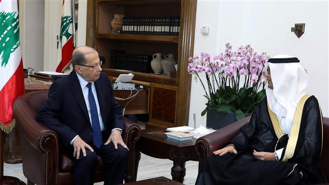 A handout picture provided by the Lebanese photo agency Dalati and Nohra on November 10, 2017 shows Lebanese President Michel Aoun (L) meeting with the Charge d’Affaires of the Saudi embassy in Lebanon Walid Bukhari. (Via AFP)
