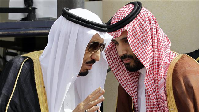 In this May 14, 2012 file photo, then-Crown Prince Salman (left) is seen speaking with his son, Mohammed. (By AP)
