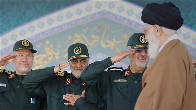 Leader of the Islamic Revolution Ayatollah Seyyed Ali Khamenei (R) greets IRGC commanders, including Commander of Quds Force Major General Qassem Soleimani (C).
