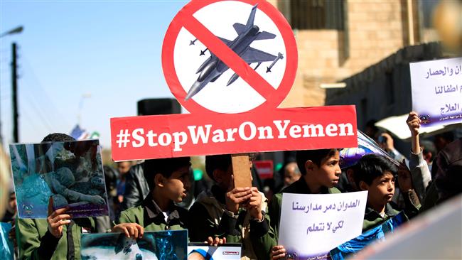 Yemeni children demonstrate on the occasion of the UN