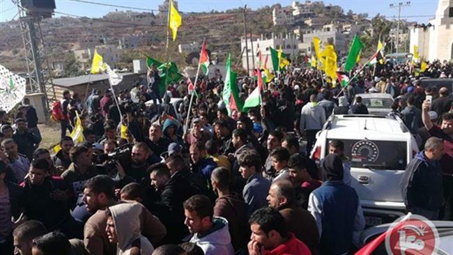 Palestinians take part in a funeral held for a farmer on December 2, 2017 who was shot by settlers in the village of Qusra in Nablus. (Photos via Ma