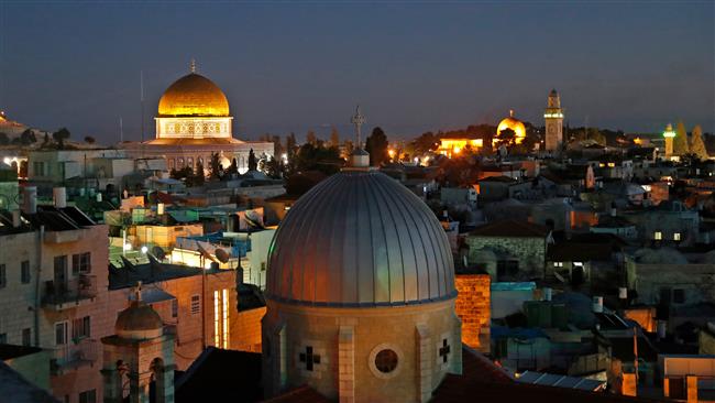 A picture taken on December 4, 2017 shows a general view of the skyline of the old city of Jerusalem al-Quds, with the Dome of the Rock (L) in the Aqsa Compound visible on the left. (By AFP)
