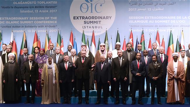 Leaders and representatives of member states pose for a group photo during an extraordinary summit of the Organization of Islamic Cooperation (OIC) on the US
