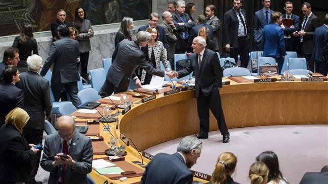 Palestinian UN envoy Riyad Mansour greets Spanish envoy Roman Oyarzun Marchesi ahead of the UN Security Council’s December 23, 2016, vote on Israeli settlements. (Photo by AFP)
