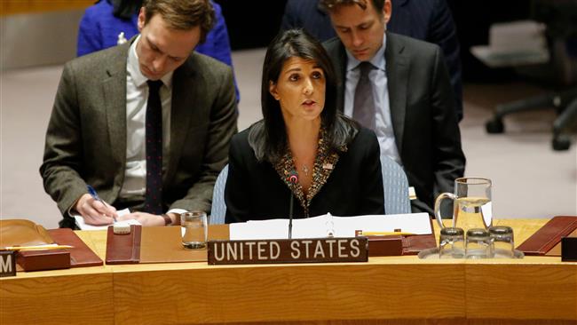 US Ambassador to the UN Nikki Haley (C) speaks after she voted against the vote on a draft resolution that would reject US President Donald Trump