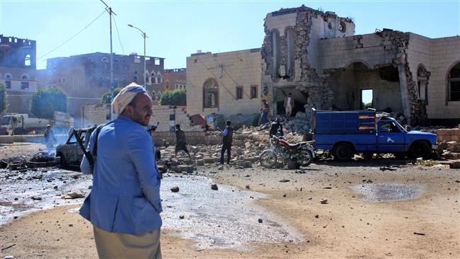 Yemenis inspect damage at the site of a Saudi-led airstrike, in the northwestern city of Sa’ada, December 20, 2017. (Photo by AFP)
