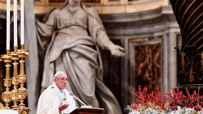Pope Francis delivers a message as he leads the holy mass to mark the world day of peace, in St. Peter’s Square at the Vatican, on January 1, 2018. (Photo by AFP)
