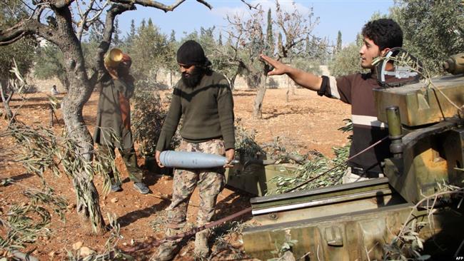 Takfiri militants from the Jaish al-Fatah prepare mortar shells before firing towards government-controlled western districts of Dahiyat al-Assad, Syria, Oct. 30, 2016. (Photo by AFP)
