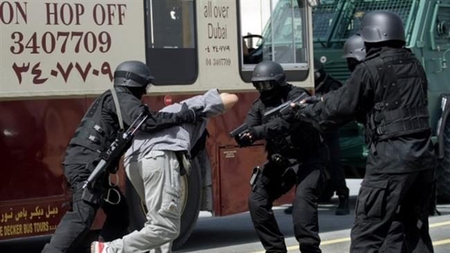 Dubai special counter-terrorism police cadets mock an urban hostage rescue mission in Dubai in April 2009. (Photo by AFP)
