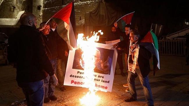 Palestinians protest a visit by US Vice President Mike Pence outside the Church of Nativity in the West Bank city of Bethlehem on January 21, 2018. (Photo by Times of Israel)
