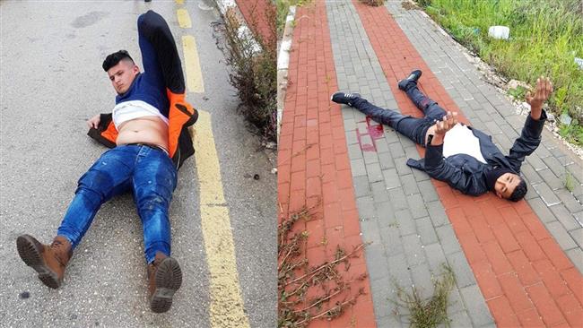 Picture published by the Palestinian Ma’an News Agency shows two Palestinian youths lying on the ground after being shot by Israeli forces in the north of Tel Aviv-occupied West Bank, January 23, 2018.
