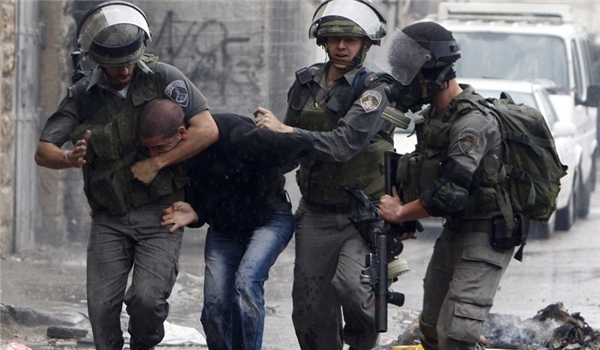 Israeli forces capture a Palestinian youth