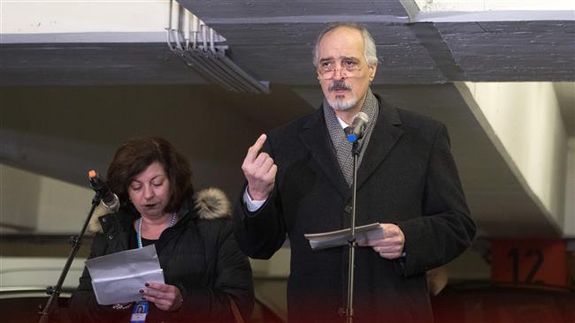 Bashar al-Ja’afari (R), the Syrian ambassador to the United Nations and head of the government delegation to intra-Syrian peace talks, speaks to journalists in Vienna, Austria, on January 26, 2018. (Photo by AFP)