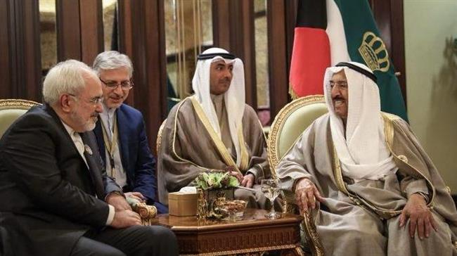 Iranian Foreign Minister Mohammad Javad Zarif (L) meets with Kuwait
