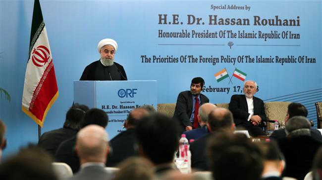 Iranian President Hassan Rouhani addresses a meeting in New Delhi on February 17, 2018 with researchers and intellectuals of the Indian-based Observer Research Foundation (ORF) about the Islamic Republic