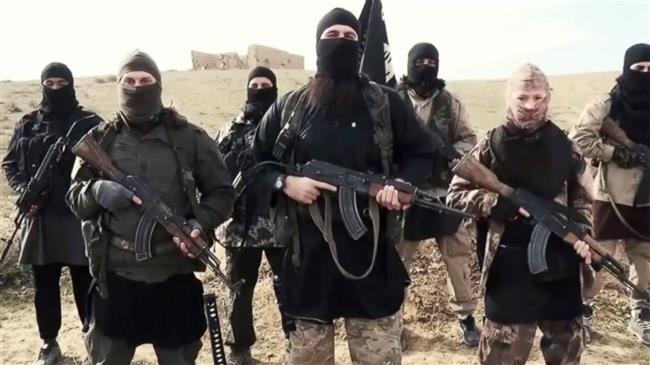 The file photo shows members of the Takfiri Daesh terrorist group in an undisclosed location.
