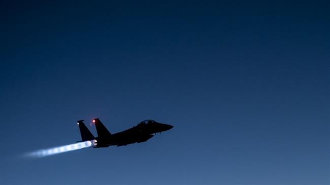 In this Sept. 23, 2014, photo, released by the US Air Force, a U.S. F-15E Strike Eagle flies over northern Iraq, after conducting airstrikes in Syria. (Photo by AP)