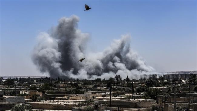 Smoke billows following an airstrike on the western frontline of the northern Syrian city of Raqqah on July 15, 2017. (Photo by AFP)
