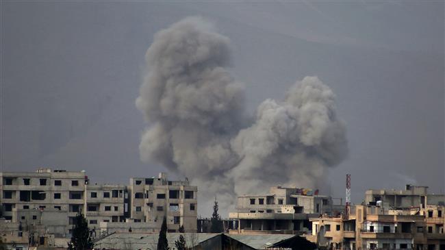 Smoke billows in the militant-controlled town of Misraba, in Eastern Ghouta region on the outskirts of the Syrian capital, Damascus, March 10, 2018. (AFP photo)
