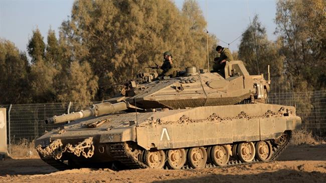 An Israeli tank near the Gazan border (Photo by AP)
