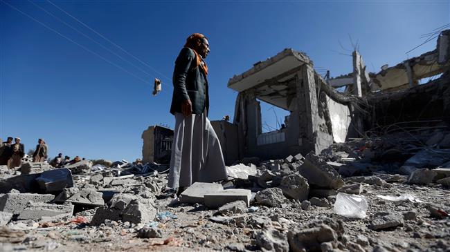 Yemenis check the damage in the aftermath of a Saudi airstrike in the Yemeni capital city of Sana’a on March 8, 2018. (Photo by AFP)
