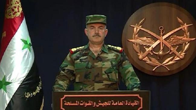 General Ali Mahyoub, the spokesman for the Syrian armed forces, announces “full victory” against terrorist groups in Eastern Ghouta in a televised statement on March 31, 2018. (Photo by SANA)
