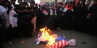 Iraqis burn US flags, shout 